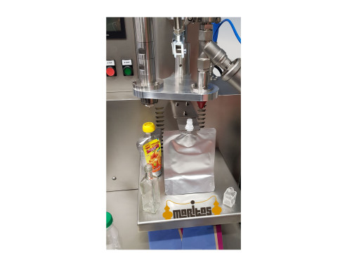 Dosificadora automática ÓPTIMA para el llenado de envases rígidos